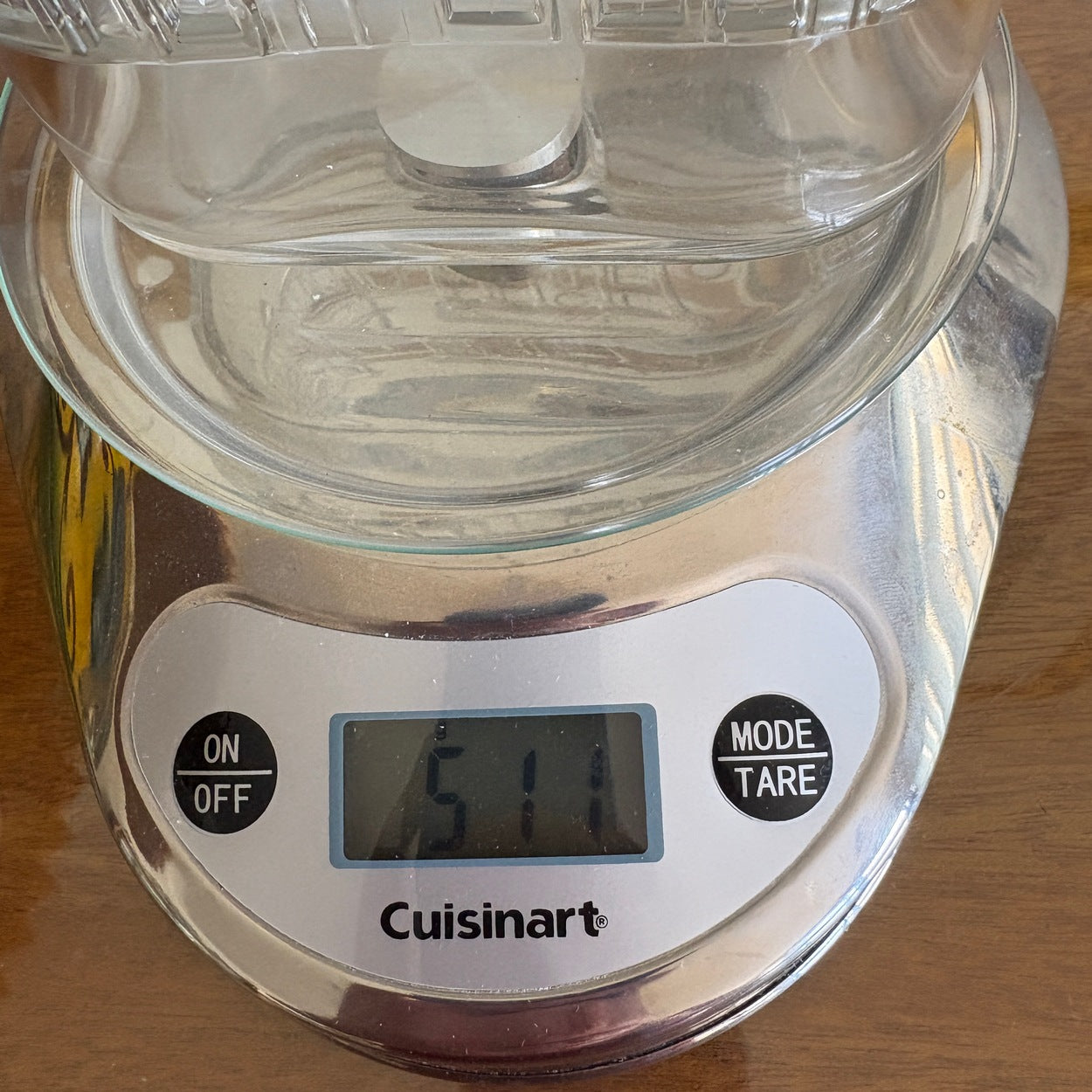 Close crop of handwritten signature and date marks inside base of Nuutajärvi decanter