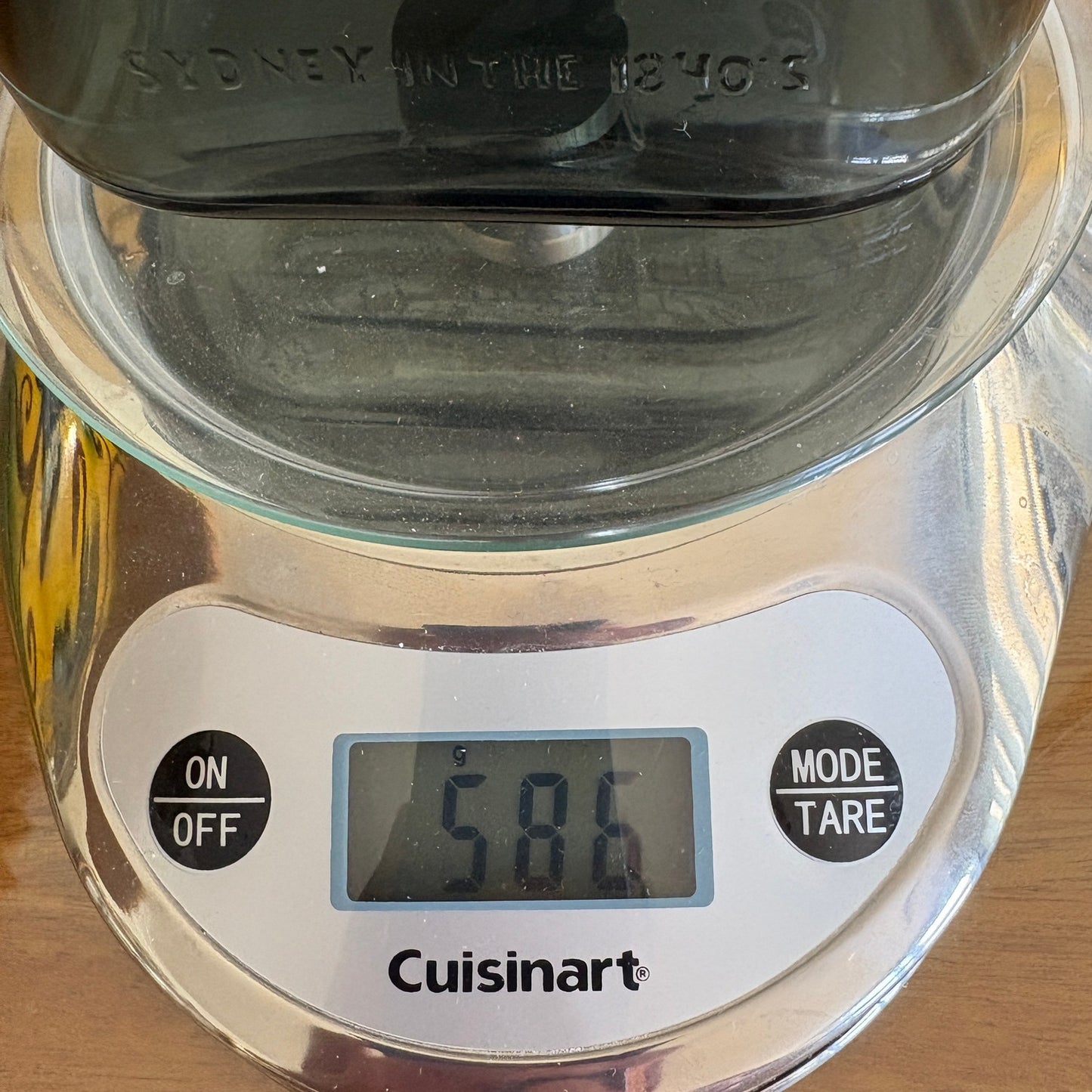 Nuutajärvi Notsjö decanter on scales — mid-century Finnish pressed glass