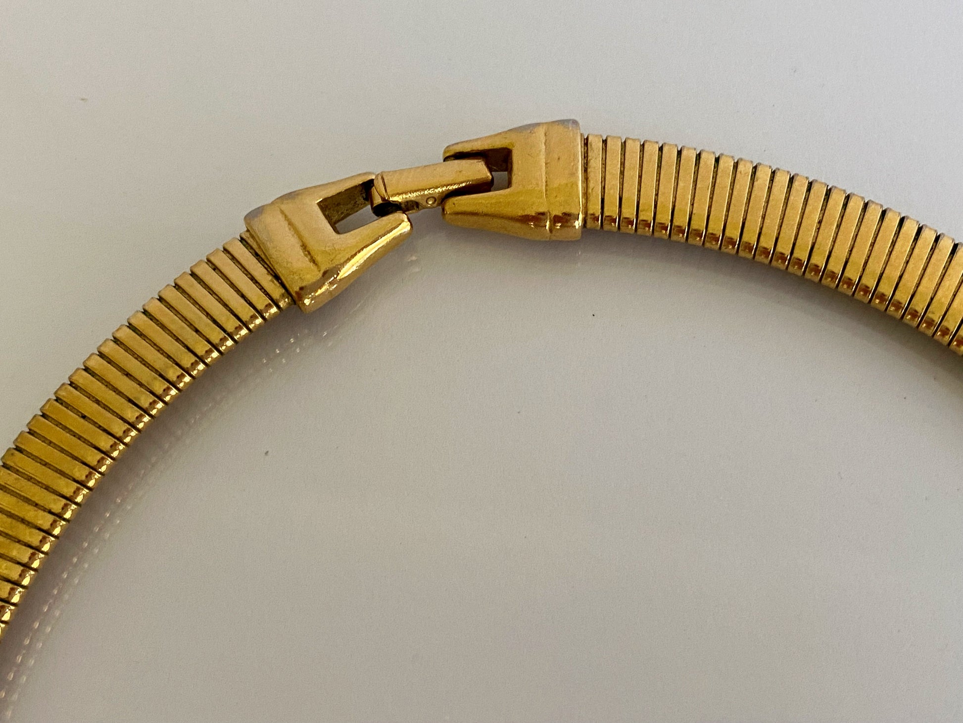 Vintage TRIFARI Gold-Plated Omega Necklace with White Cabochon - Busy Bowerbird