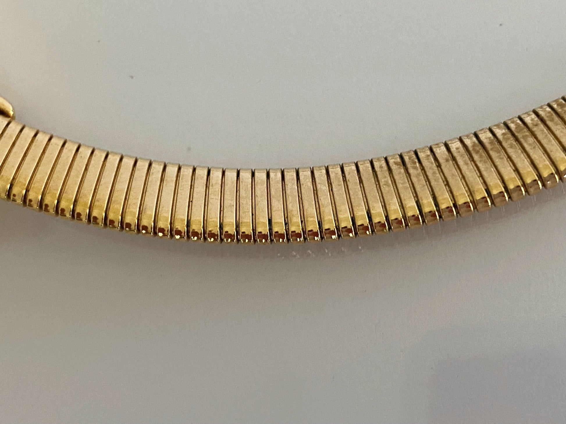 Vintage TRIFARI Gold-Plated Omega Necklace with White Cabochon - Busy Bowerbird