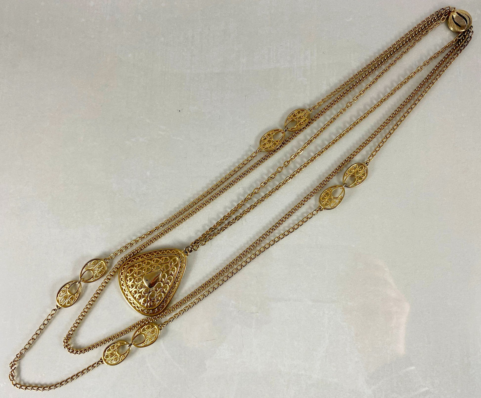 Vintage Three-Strand Gold-Tone Sautoir Necklace with Filigree Teardrop Pendant - Busy Bowerbird