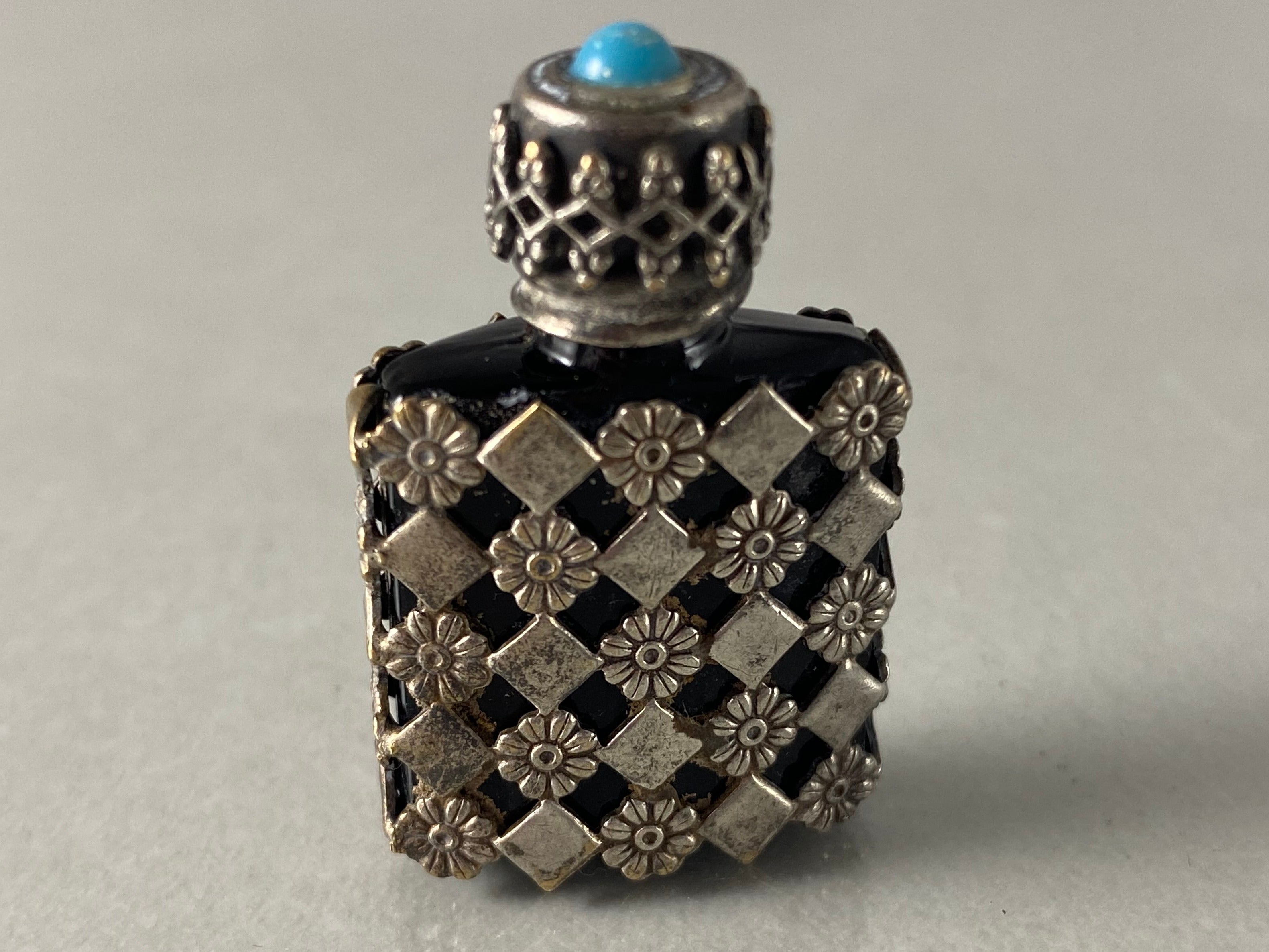 Sold Vintage 1920's black perfume bottle