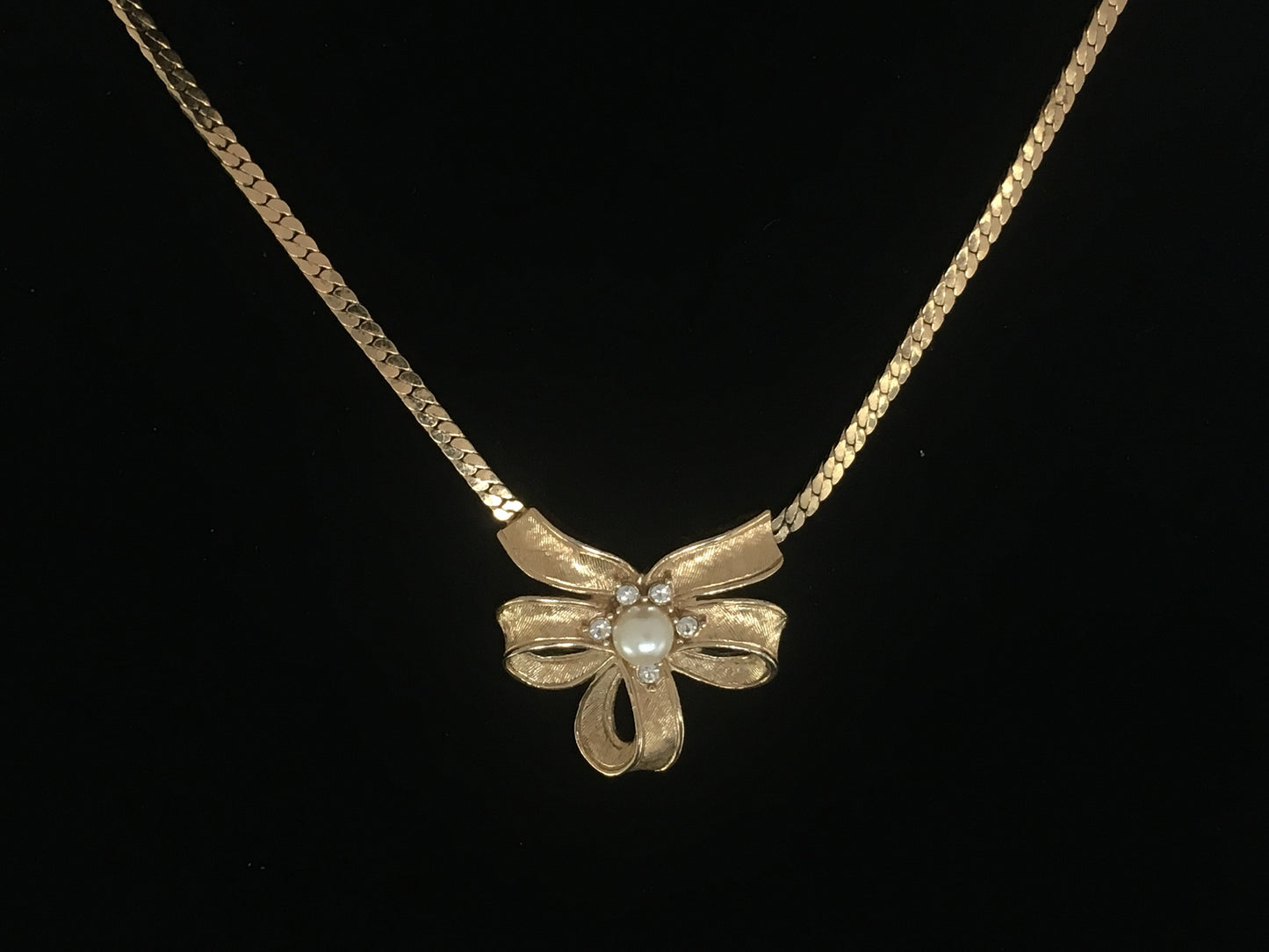 Vintage TRIFARI Gold-Tone Necklace with Triple-Loop Bow Pendant - Busy Bowerbird