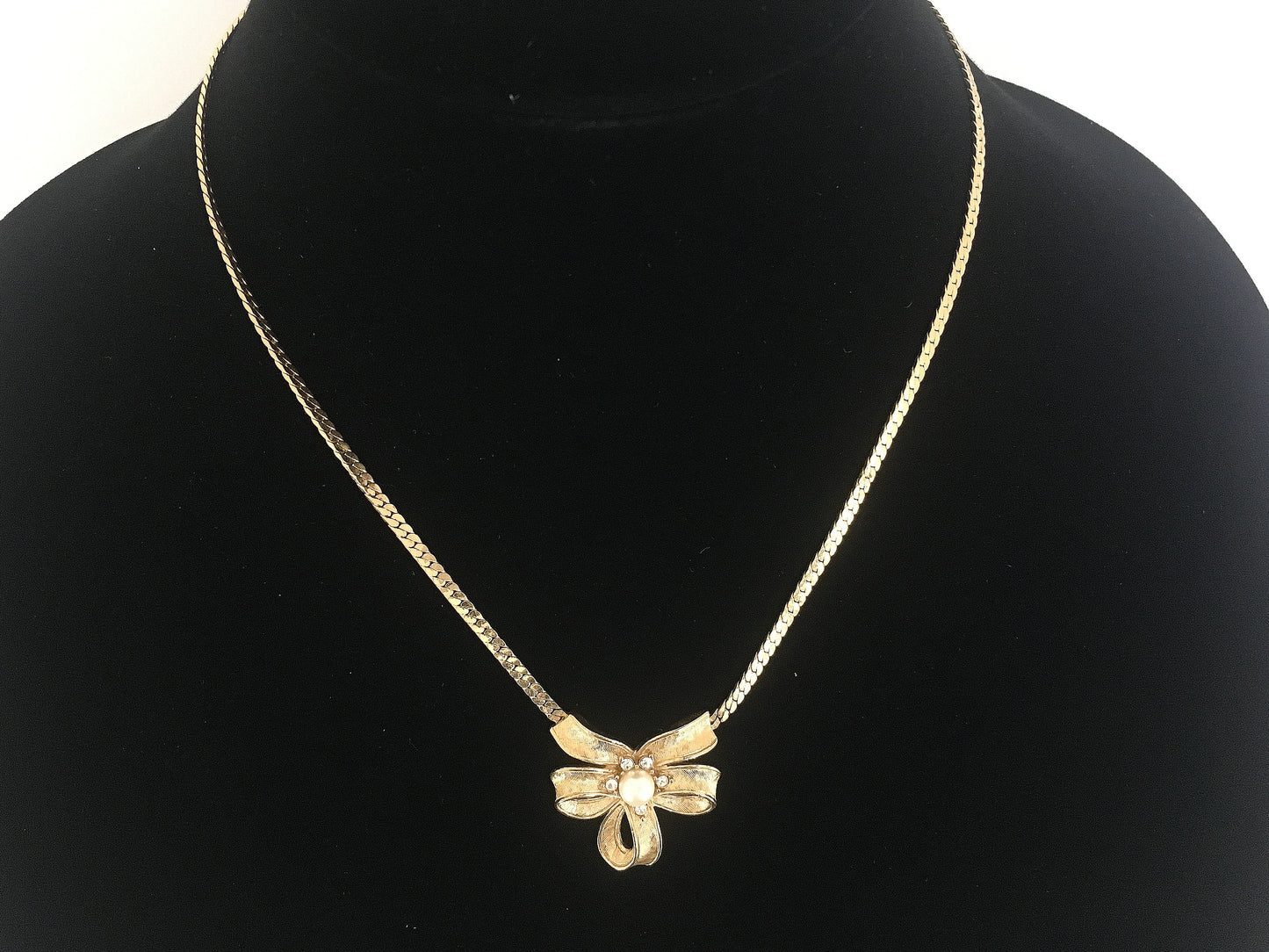 Vintage TRIFARI Gold-Tone Necklace with Triple-Loop Bow Pendant - Busy Bowerbird