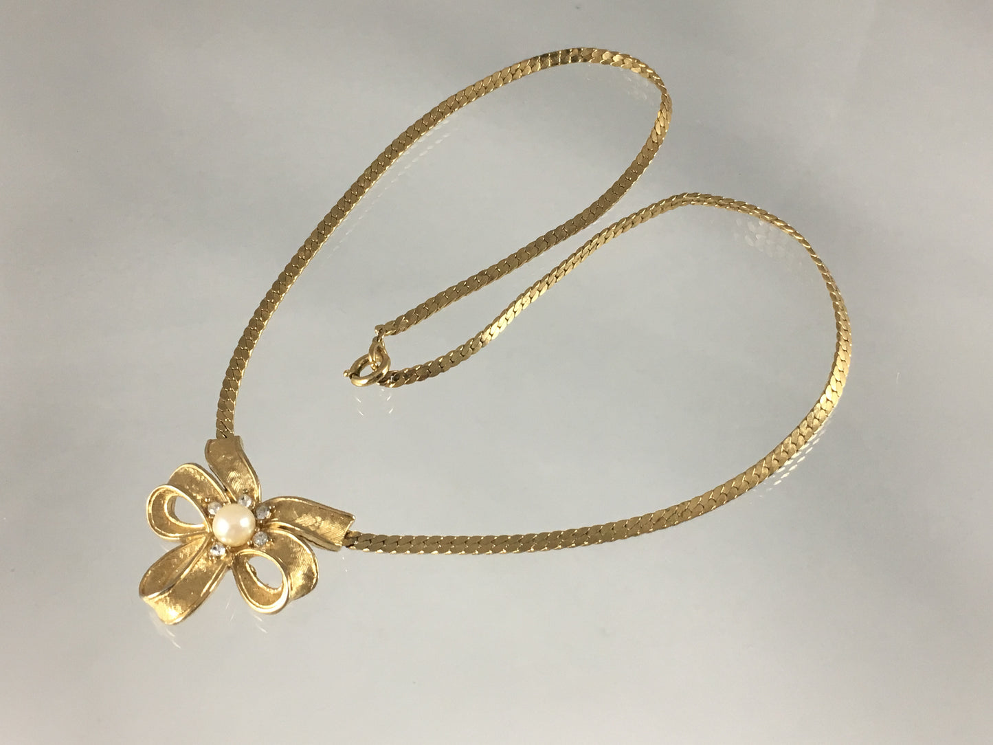 Vintage TRIFARI Gold-Tone Necklace with Triple-Loop Bow Pendant - Busy Bowerbird