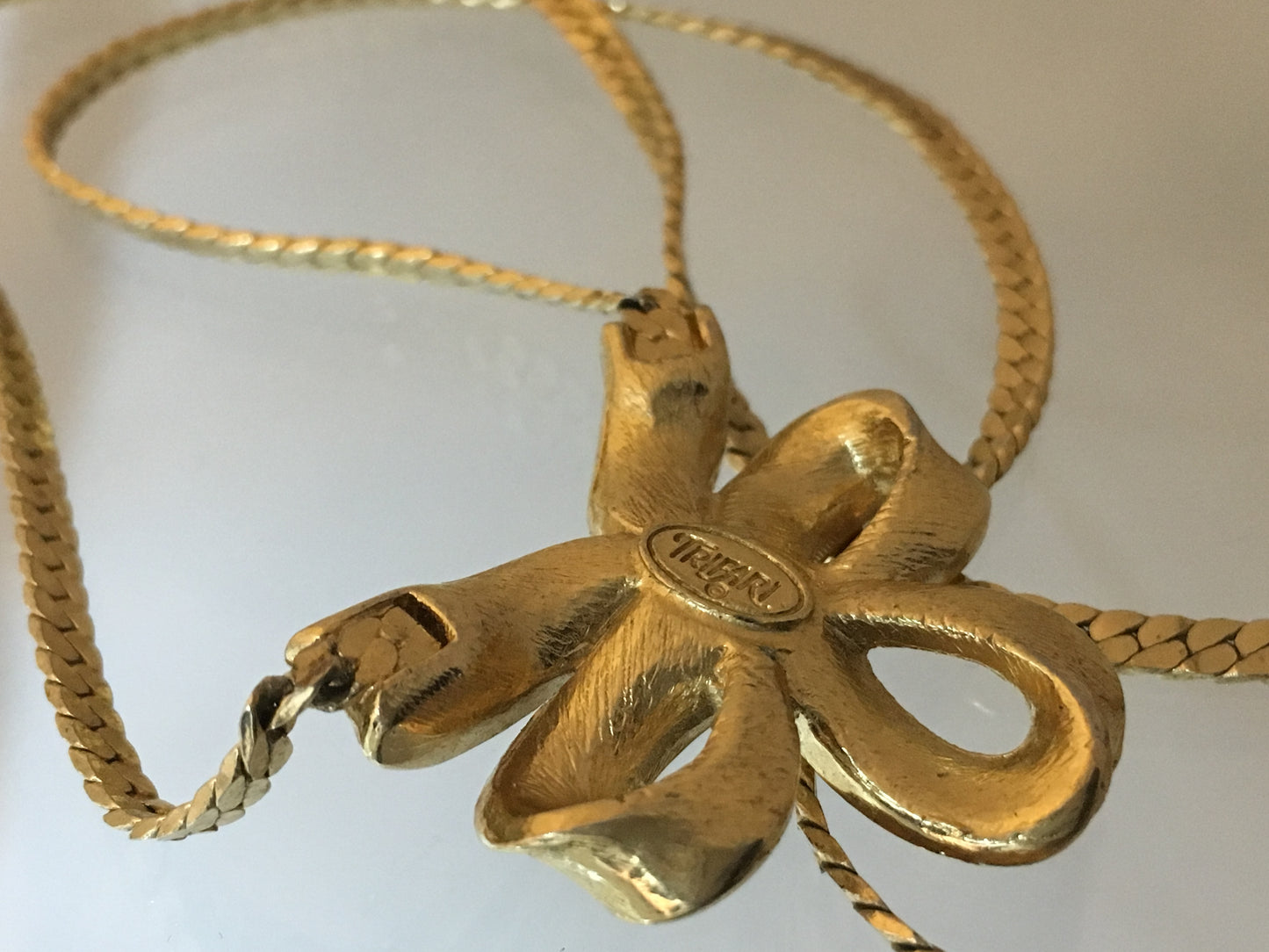 Vintage TRIFARI Gold-Tone Necklace with Triple-Loop Bow Pendant - Busy Bowerbird