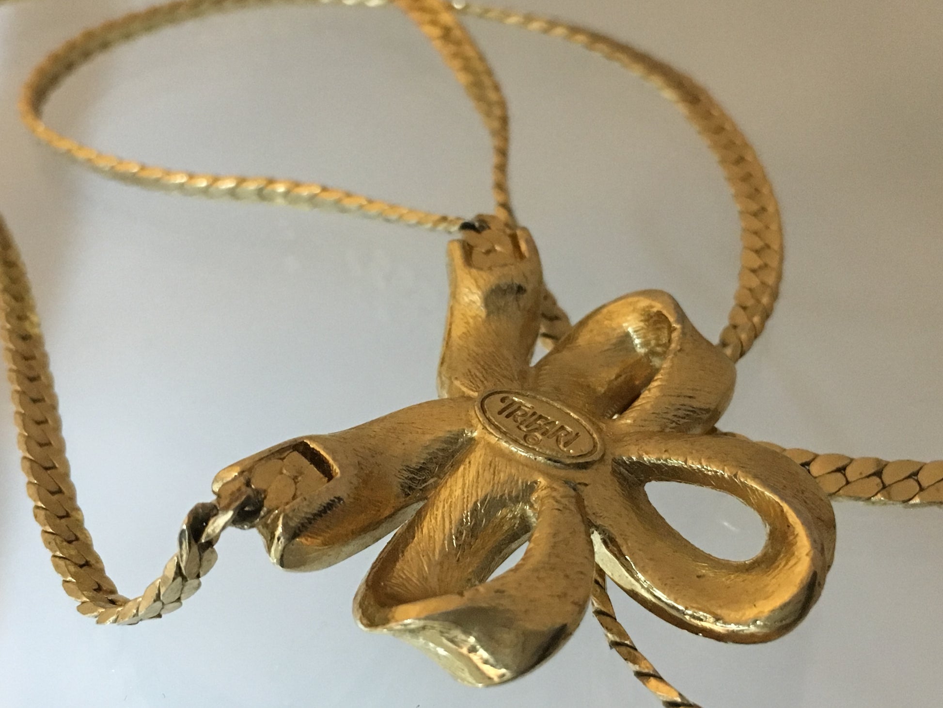 Vintage TRIFARI Gold-Tone Necklace with Triple-Loop Bow Pendant - Busy Bowerbird