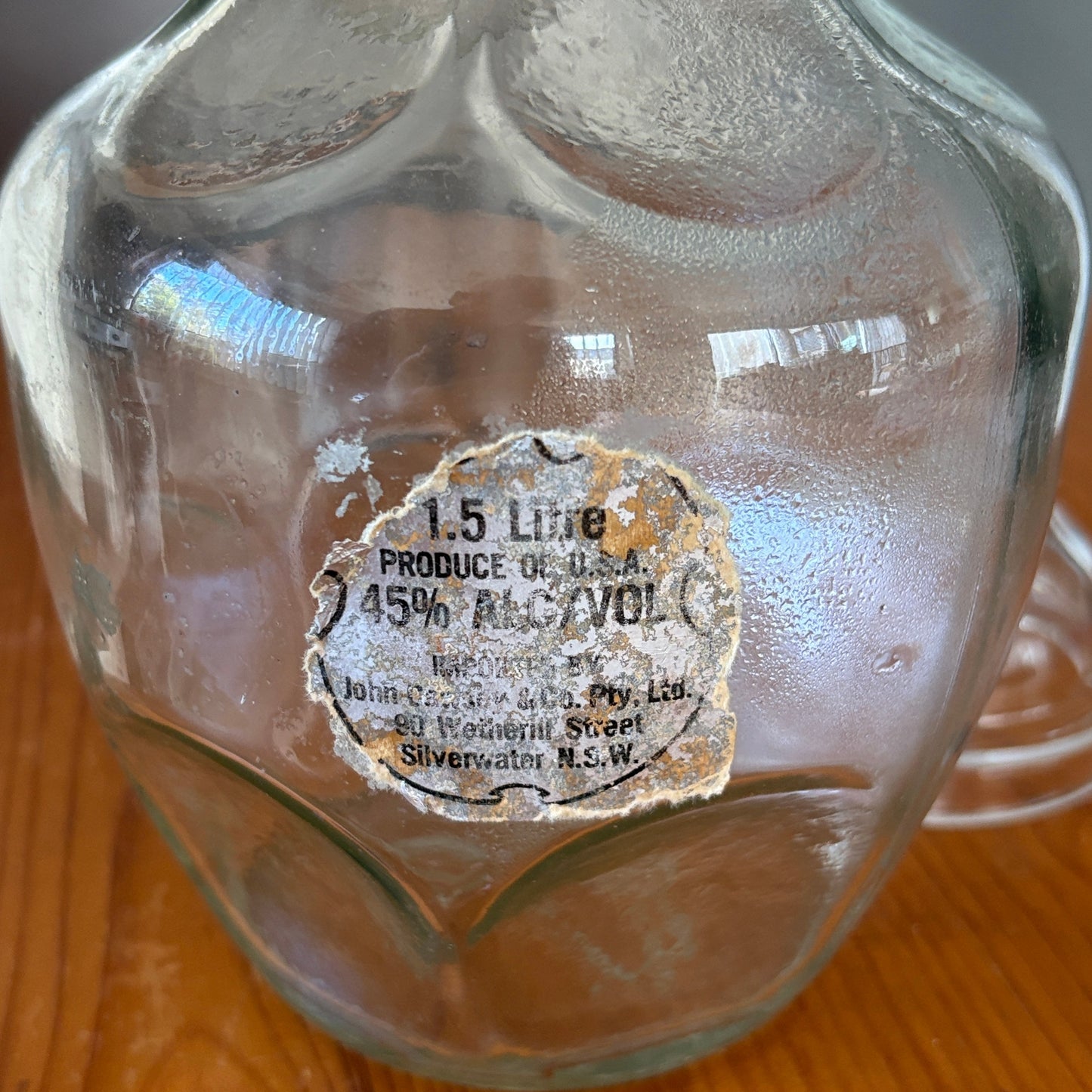 John Cawsey importer label on the back of Vintage 1979 Jack Daniel's Belle of Lincoln 1.5L Decanter