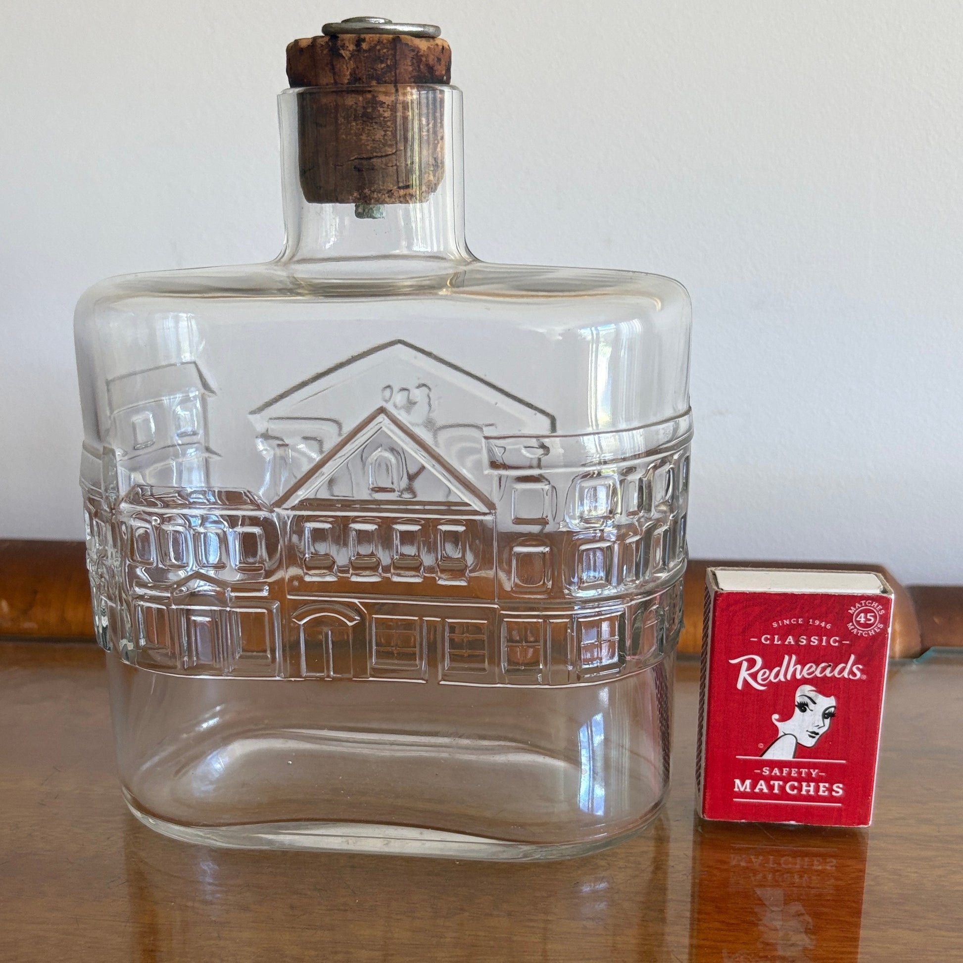 Nuutajärvi Notsjö decanter with matchbox for scale — mid-century Finnish pressed glass